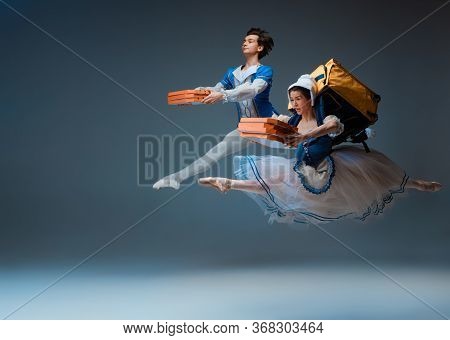 Modern Cinderella And Prince Hurrying Up, Deliverying Pizza. Young And Graceful Ballet Dancers On St