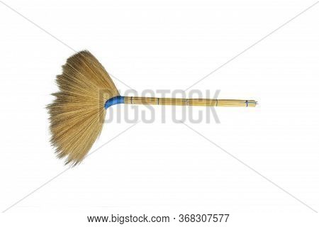 Old Traditional Hand Made Broom,from Flowers And Grass Are Hand-made On White Background​.blue Braid