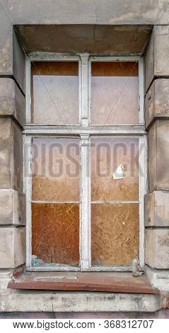 Broken Glass In Old Wooden Window Of Old Tenement House In Wroclaw City