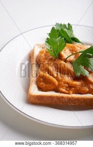 Healthy Toast With Zucchini Caviar. Russian Traditional Sandwich Served In A Plate With Herbs On A W