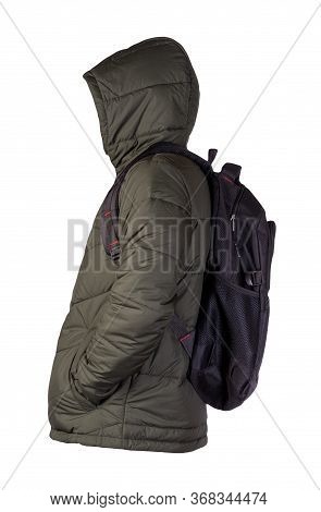 Black Backpack Dressed In A Hakki Jacket Isolated On A White Background. Rear View Of A Backpack And