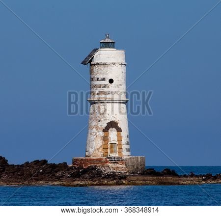 The Lighthouse Of The Boat Eater Of Calasetta, South Sardinia, On A Beautiful Summer Day