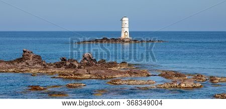 The Lighthouse Of The Boat Eater Of Calasetta, South Sardinia, On A Beautiful Summer Day