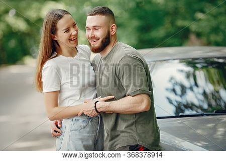 Beautiful Couple Spend Time On A Summer Forest