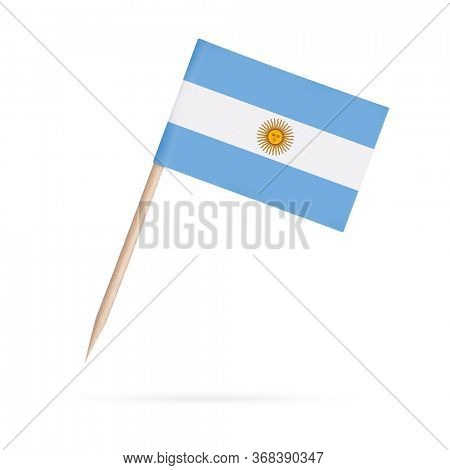 Miniature paper flag Argentina. Isolated Argentinian toothpick flag stick on white background. With shadow below.