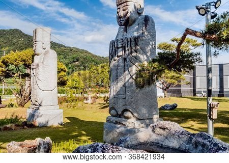 Gimcheon, South Korea; May 24, 2020: Two Giant Stone Statue Of Korean Priest On Display At Rock Gard