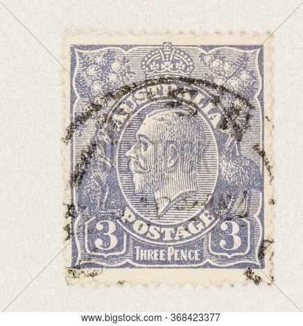 Seattle Washington - May 27, 2020:  King George V In Blue On 3 Pence Australian Postage Stamp, With 