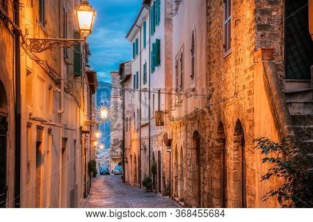 Terracina, Italy. Night Evening View Of Old Street In Illuminations.