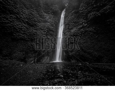 Black And White , Long Exposure Of A Beautiful Waterfall In Bali / Indonesia