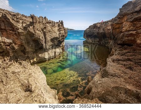 Angel's Billabong A Natural Tide Pool Next To The Rocky Coast Of The Sea