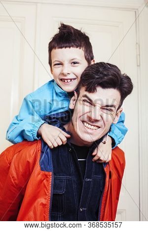 Faher And Son Together Having Fun At Home, Lifestyle Happy Family, People At Home
