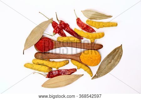 Kitchen Table With Spices And Dry Herbs