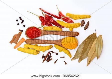 Kitchen Table With Spices And Dry Herbs