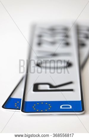Closeup Of German License Plates On White Background