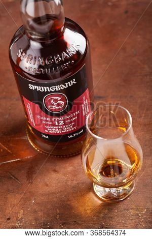 Trondheim, Norway - May 20 2020: Springbank single malt scotch whisky bottle and glass