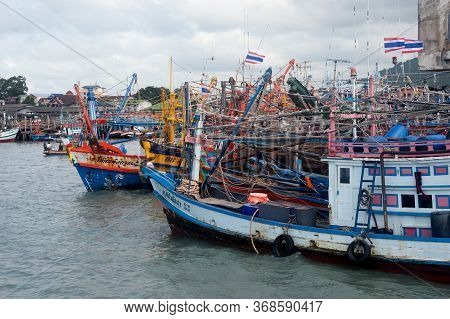 Rayong,thailand-february 8,2013: A Group Of Fishing Boats Moored In The Harbor To Avoid The Monsoon 