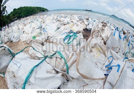 Rayong,thailand-february 8,2013 :  Large Sacks Or Plastic Bags Containing Sand That Contains Contami