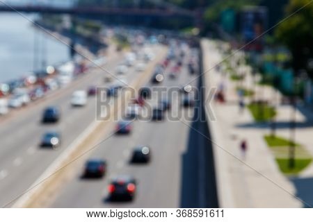 Blurred Abstract Background Of Traffic Cars On The Multi Lane Highway During Rush Hour
