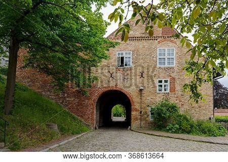 Historic Stone Gate House, German Steintorhaus, With Tunnel Passage Next To Ratzeburg Cathedral And 