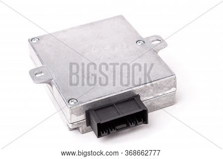 Plastic Car Engine Control Unit With Metal Elements On A White Isolated Background In A Photo Studio