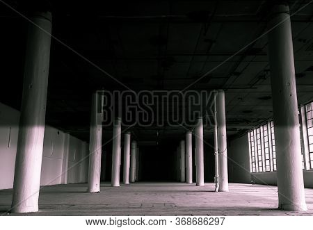 Abstract Dark Pathway Inside An Industrial Building