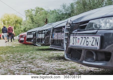 Blato,croatia May 2020
Front Nose Of An Alfa Romeo 159 In Focus, 156 In Foreground. Multiple Black C
