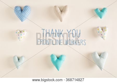 Thank You Frontline Workers Message With Blue Heart Cushions On A White Paper Background