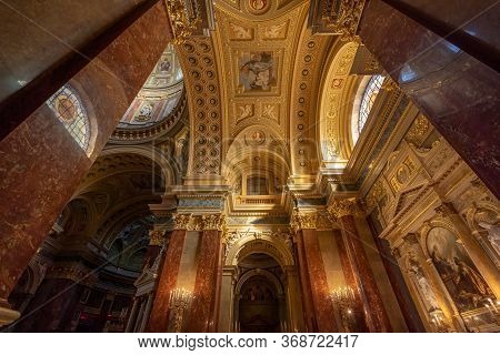 Budapest, Hungary - Feb 8, 2020: Ultrawide View Of Ceiling Window Inside St. Stephen Basilica With S