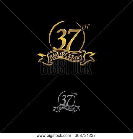 Celebrating The 37th Anniversary Logo, With Gold Rings And Gradation Ribbons Isolated On A Black Bac