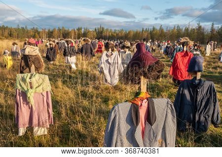 Installation Silent people at sunset in Finland