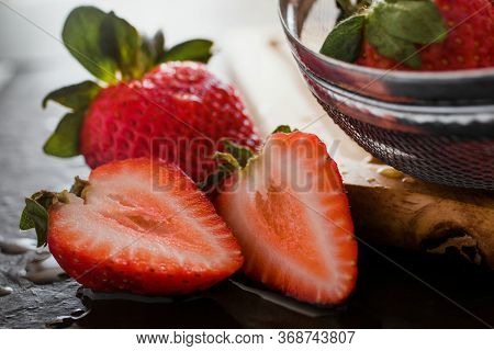 Half Fresh Strawberries Juicy Fruit On Wooden Table