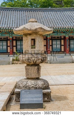 Haeinsa-gil, South Korea; May 26, 2020: Stone Lantern In Inner Court Of Haeinsa Temple With Temple B