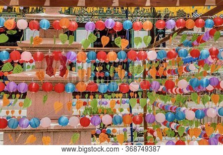Haeinsa-gil, South Korea; May 26, 2020: Prayers Written On Heart Shaped Paper Attached To Paper Lant