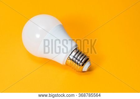 Led, New Technology Light Bulb On Yellow Background, Energy Super Saving Electric Lamp Is Good For E