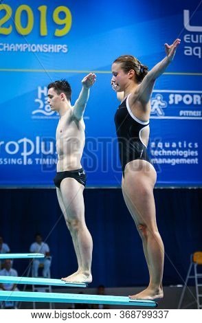 Kyiv, Ukraine - August 6, 2019: Tina Punzel And Lou Massenberg Of Germany Perform During Mixed 3m Sy