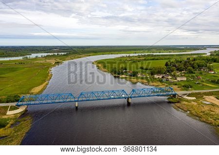 Aerial Panoramic View From Above To The Bridge Over The River Lielupe Near Kalnciems, Latvia