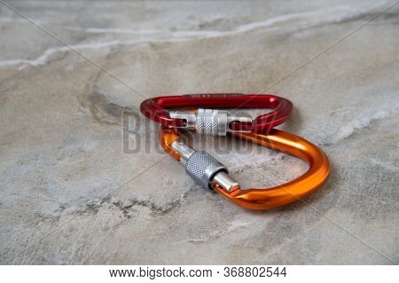 Screw Gate Carabiners On A Marble Top