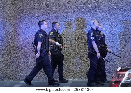 May 29, 2020 - Houston, Texas, USA: Police and spectators collide in downtown Houston, TX as rioters protest the beating and killing of George Floyd by Minneapolis police earlier in the week.
