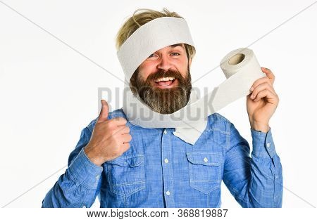 Coronavirus Toilet Paper Shortage. Essential Goods. Consumerism. Man Hold Toilet Paper. Hipster Guy 