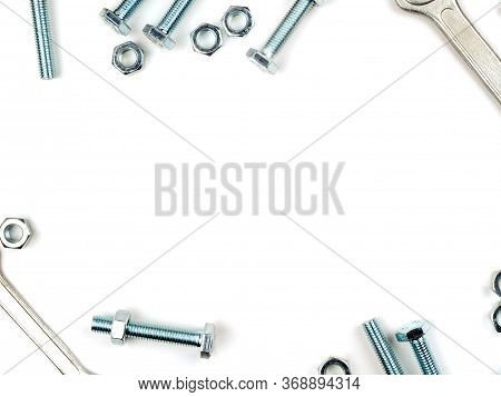 Graphic Resources Frame For Inserting Text Lined With Bolts Nuts And Wrenches. Fastener In The Form 