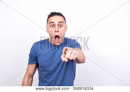 Man Pointing In Front With Index Finger