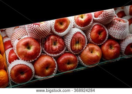 Close Up View Of Fruits Shelf In Supermarket. Apple Background