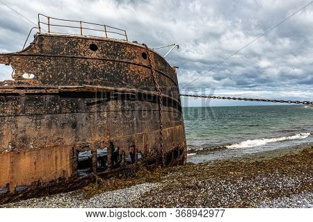 Wreck of Amadeo steamship build in 19th century in United Kingdom is since 1932 beached near Estancia San Gregorio, Chile