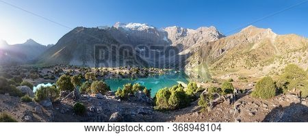 Beautiful Scenery Of Mountain Lake. Alaudin Lake In Fann Mountains, Tajikistan. Sunrise In Summer Da