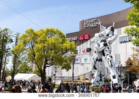 Tokyo, Japan - April 28, 2019, The Unidentified Traveler Look At Rx-0 Unicorn Gundam Statue In Norma