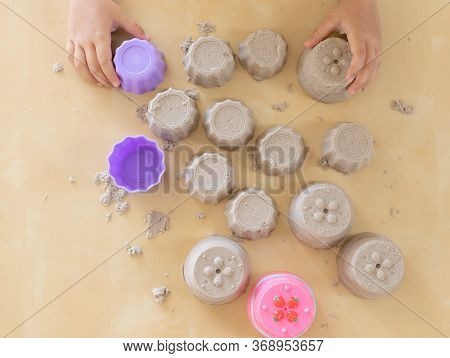 Kinetic Sand. Child Playing With Kinetic Sand. Indoor Creative Games. Top View.