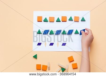 The Child Arranges Blocks Of Various Shapes According To The Pattern. The Development Of Thinking, A
