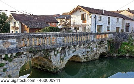 Allemans-du-dropt, France - 26 March 2022:  Bridge On The Dropt River. The Bridge Was Built In 1145.