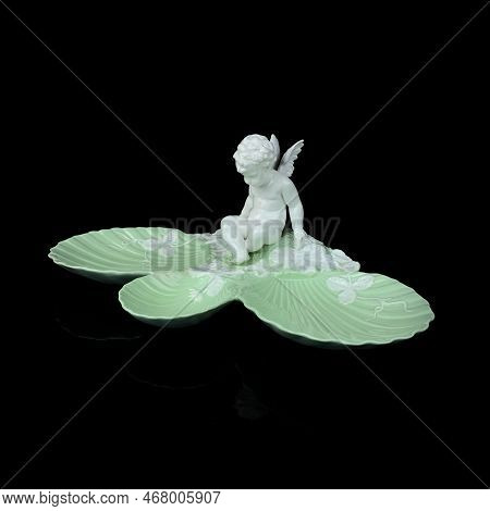 Beautiful Vase With A Flower Pattern On A Black Isolated Background. Antique Porcelain Vase With Pai