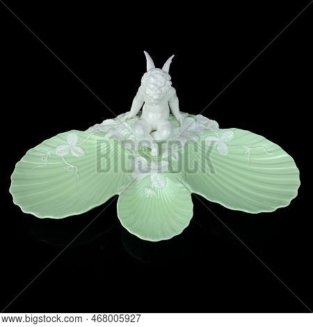 Beautiful Vase With A Flower Pattern On A Black Isolated Background. Antique Porcelain Vase With Pai
